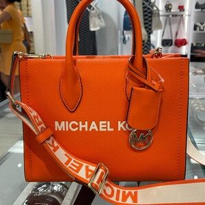 Michael Kors Mirella Small Pebbled Leather Shopper Top Zip Crossbody XBODY
Poppy